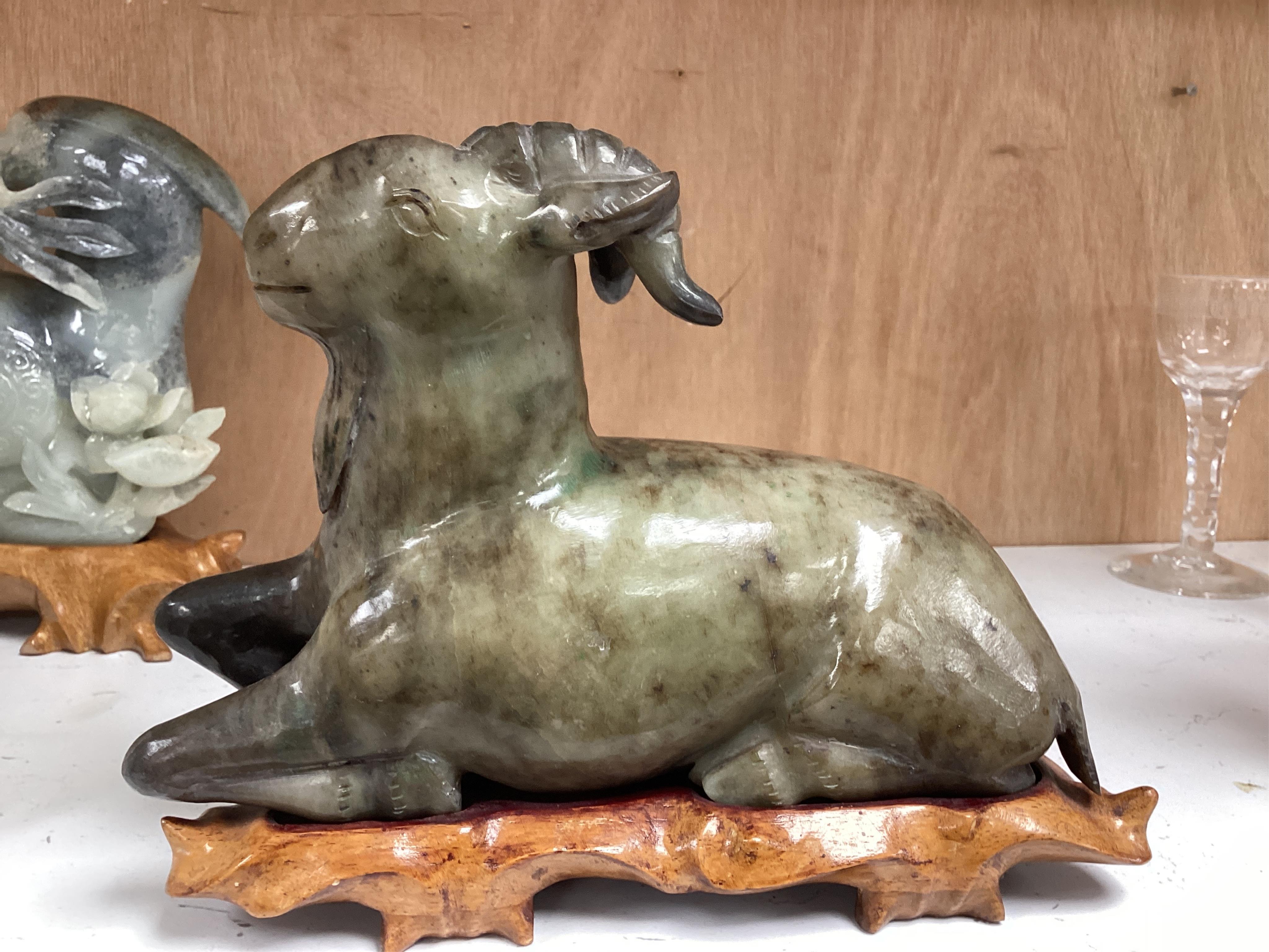Two modern jade figures, together with a marble Buddha and a carved giltwood figure, largest 24cm wide